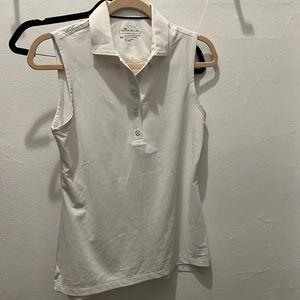 White sleeveless golf polo